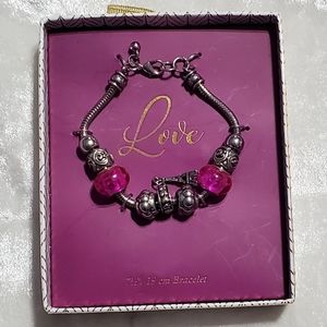 "Love" Silver Tone Bracelet With Charms